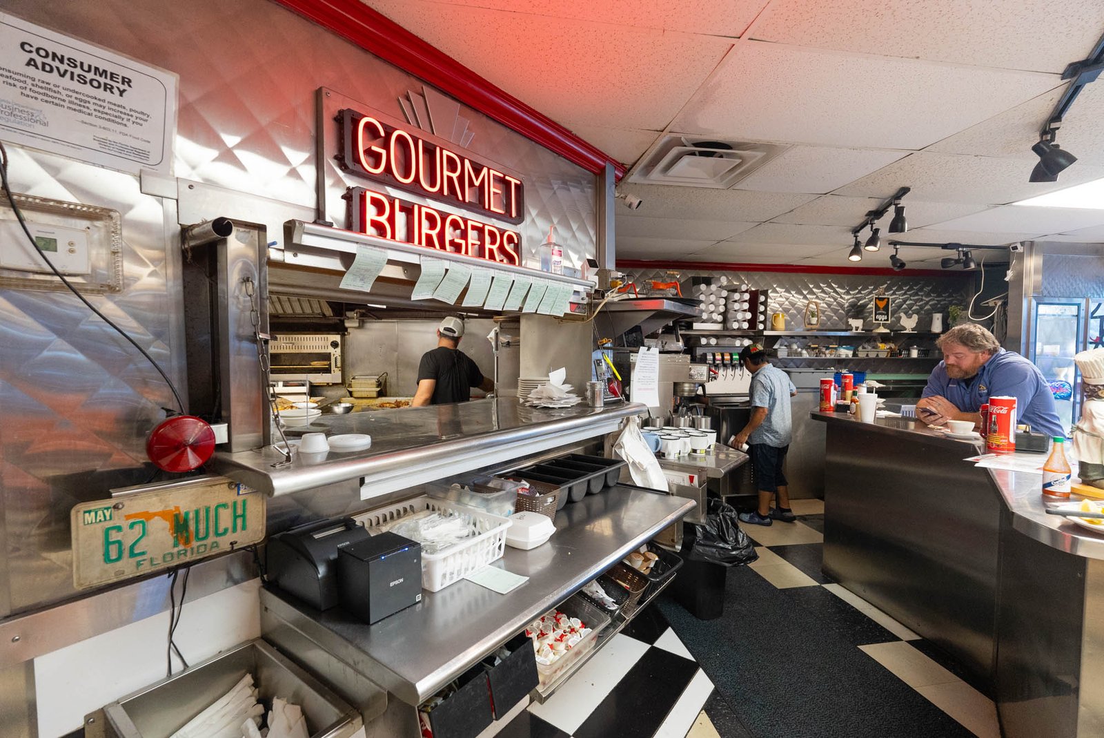 The open kitchen and counter inside Martha’s Family Restaurant